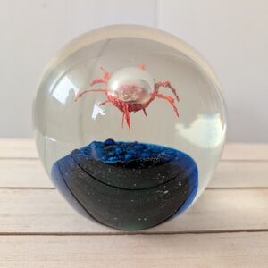 Artistic Glass Sphere with Red and Blue Design